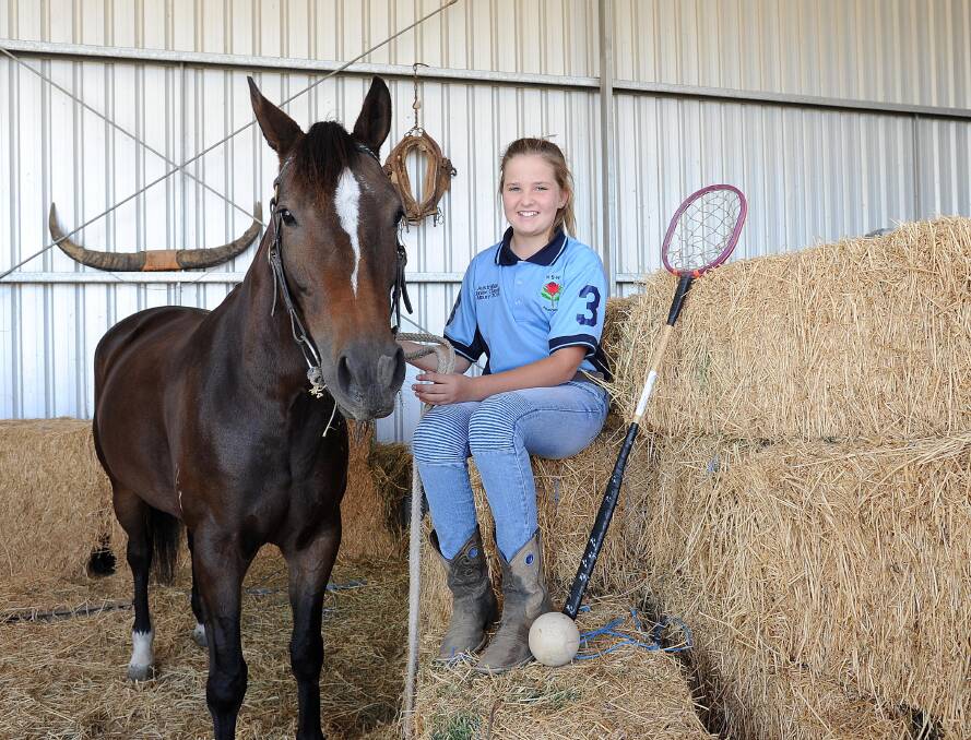 Top selection: Holbrook's Kasey Henry with her horse Noonamah Dora. Kasey has been selected to play in the under 12s team at the Polocrosse Nationals in Albury. Picture: Laura Hardwick.