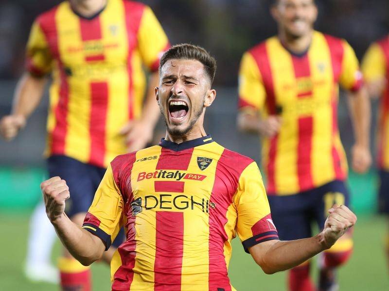 Lecce's Remi Oudin celebrates after scoring the only goal in the La Liga match against Genoa. (EPA PHOTO)