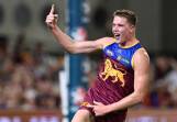 Debutant Logan Morris celebrates his first AFL goal in the Lions' win over the Suns. (Darren England/AAP PHOTOS)